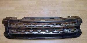 Решетка радиатора grille surround LR 044121 - Фото #1